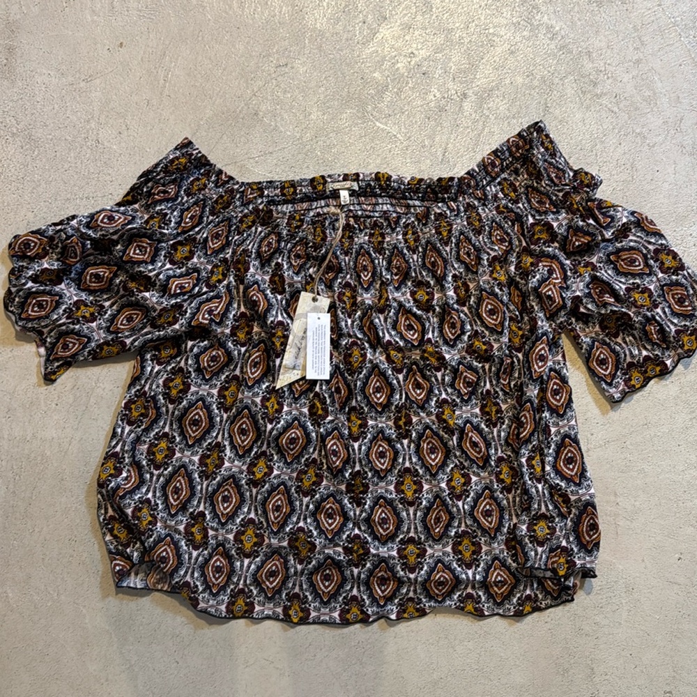 Off the shoulder light shirt